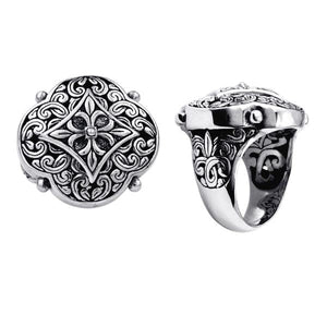 Wholesale sterling silver Balinese statement ring with ornate floral medallion design, oxidized detailing, and handcrafted scroll patterns – artisan jewelry from Bali.