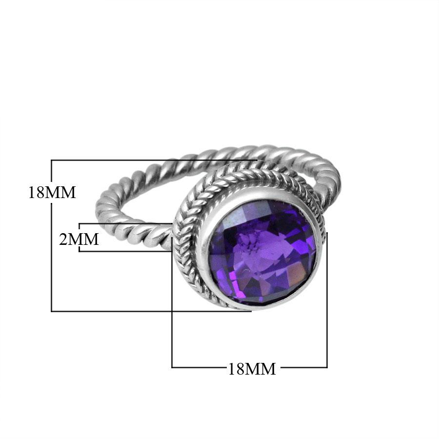 Sterling silver ring with a round Amethyst Quartz and rope-style band design.