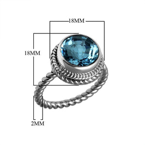 Sterling silver ring with a round Blue Topaz Quartz and rope-style band design.