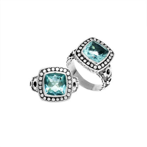 Wholesale sterling silver ring with cushion-cut Blue Topaz Quartz in a dotted bezel, handcrafted in Bali.