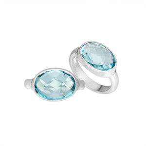 Wholesale oval cut Blue Quartz 925 Sterling Silver ring handcrafted in Bali with polished finish.