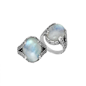 Wholesale Sterling Silver oval Rainbow Moonstone cabochon ring with Balinese engraved band design