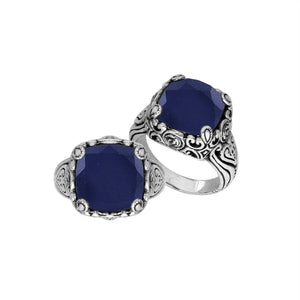 Sterling Silver ornate statement ring with Blue Sapphire and intricate Bali-inspired detailing.
