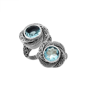 Sterling silver Balinese design ring with round shape Blue Topaz stone