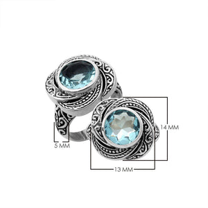 Sterling silver Balinese design ring with round shape Blue Topaz stone