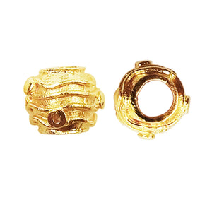 Handcrafted coil-textured round bead with 18K gold overlay over copper made in India.