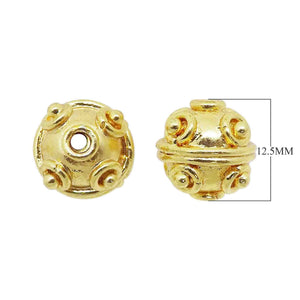 Handcrafted round 18K gold overlay copper spacer bead with raised decorative dots, made in India for wholesale jewelry production.