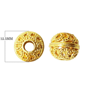 Handcrafted embossed round bead with 18K gold overlay over copper, featuring swirling motifs, made in India for wholesale jewelry making.