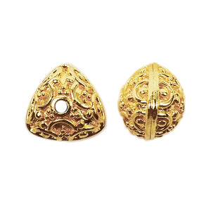 Handcrafted triangular-round filigree bead with 18K gold overlay over copper, made in India for wholesale jewelry production.
