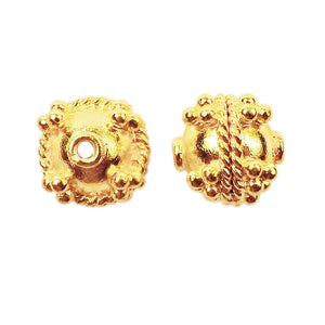 Handcrafted round spacer bead with granulated dots and rope border, made with 18K gold overlay over copper in India for wholesale jewelry production.