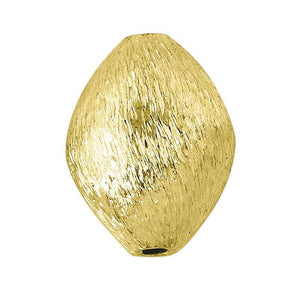 Handcrafted brushed oval barrel bead with 18K gold overlay over copper, made in India for wholesale jewelry production.