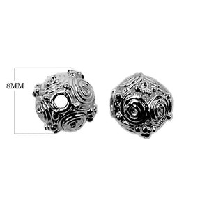 Black rhodium overlay over copper handcrafted textured spherical bead with spiral detailing for wholesale jewelry making