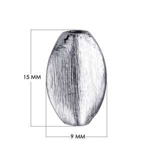 Silver overlay over copper handcrafted oval barrel bead from India with brushed antique finish