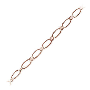 Rose Gold Overlay slim elongated link chain handcrafted in India, sold per foot for wholesale jewelry making and lightweight chain designs.
