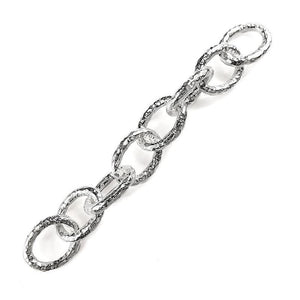 Silver overlay over copper beading and extender chain with bold textured oval interlocking links displayed for wholesale jewelry manufacturing and bulk use