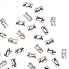 Silver overlay over copper twisted crimp beads handcrafted in India for wholesale jewelry making