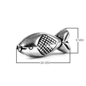 Silver overlay charm in a fish shape over copper, handcrafted in India for bulk jewelry supply and professional designers.