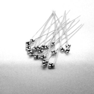 Handcrafted silver overlay over copper cluster ball head pin made in India for wholesale jewelry production.