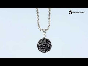 Handcrafted 925 Sterling Silver Abalone Shell round pendant featuring floral center pattern, mirror-polished finish, and iridescent tones with detailed Balinese silver artistry for wholesale buyers.