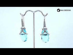 Sterling silver Blue Topaz Quartz drop earrings with woven silver detailing for wholesale jewelry collections.
