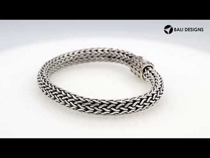 925 sterling silver woven Bali bracelet with Amethyst Quartz stone clasp and oxidized finish.