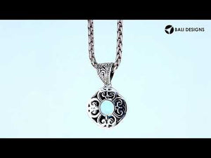 Sterling silver round pendant with Blue Topaz Quartz handcrafted in traditional Balinese design