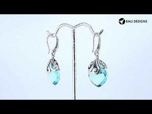 Sterling silver Blue Topaz Quartz earrings with faceted teardrop design and ornate silver scrollwork for wholesale collection.