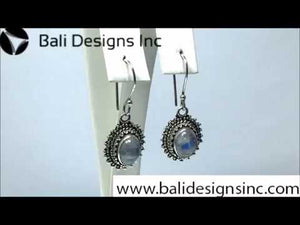 Wholesale sterling silver Bali granulated earrings featuring oval rainbow moonstone cabochons with polished–oxidized detailing, crafted to elevate artisan-inspired wholesale jewelry assortments with traditional handcrafted beauty.