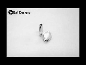 Silver overlay over copper handcrafted oval barrel bead from India with brushed antique finish