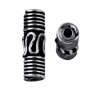 Handcrafted silver overlay tube bead over copper with engraved design and oxidized finish from India for wholesale jewelry use