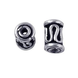 Handcrafted silver overlay tube bead over copper with openwork design and oxidized finish from India for wholesale jewelry components