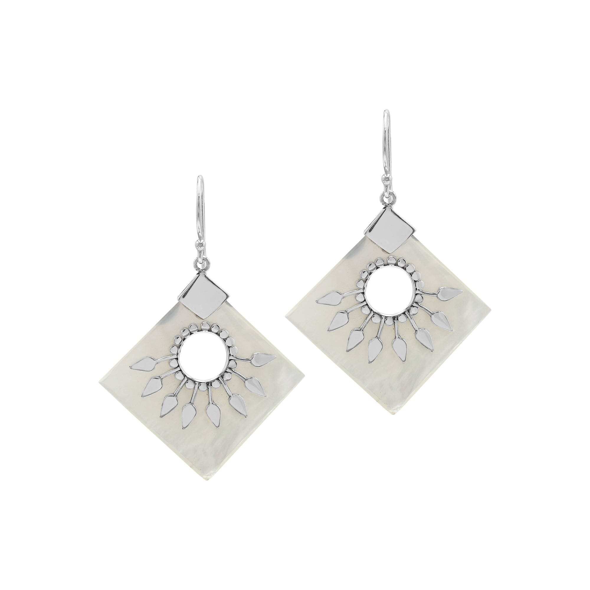Sterling silver tribal earrings with Mother Of Pearl diamond panels and silver sunburst accents.