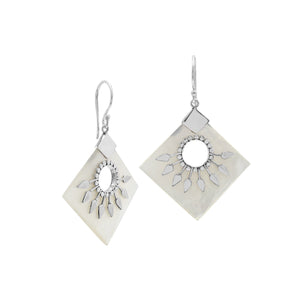 Sterling silver tribal earrings with Mother Of Pearl diamond panels and silver sunburst accents.
