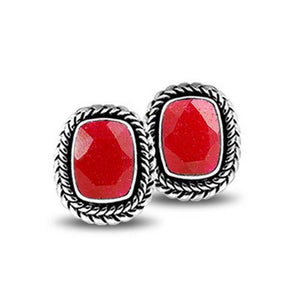 Sterling Silver Stud Earrings With Cushion Ruby And Braided Border Detailing.