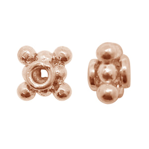 Bali floral spacer component in rose gold overlay over copper handcrafted in India for wholesale jewelry manufacturing