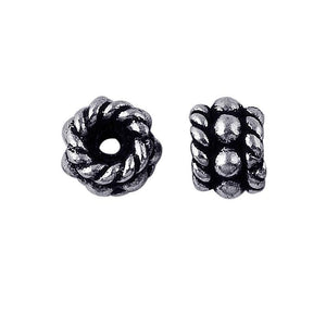Silver Overlay Over Copper antique twisted rope style spacer jewelry component, handcrafted in India, shown in front and side view.