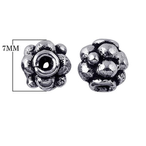 Silver Overlay Over Copper antique rounded floral bead spacer jewelry component, handcrafted in India, shown in front and side view.