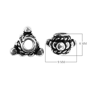 Handcrafted tribal floral spacer bead made with Silver Overlay Over Copper, raised rounded accents and rope detailing, artisan jewelry component from India.