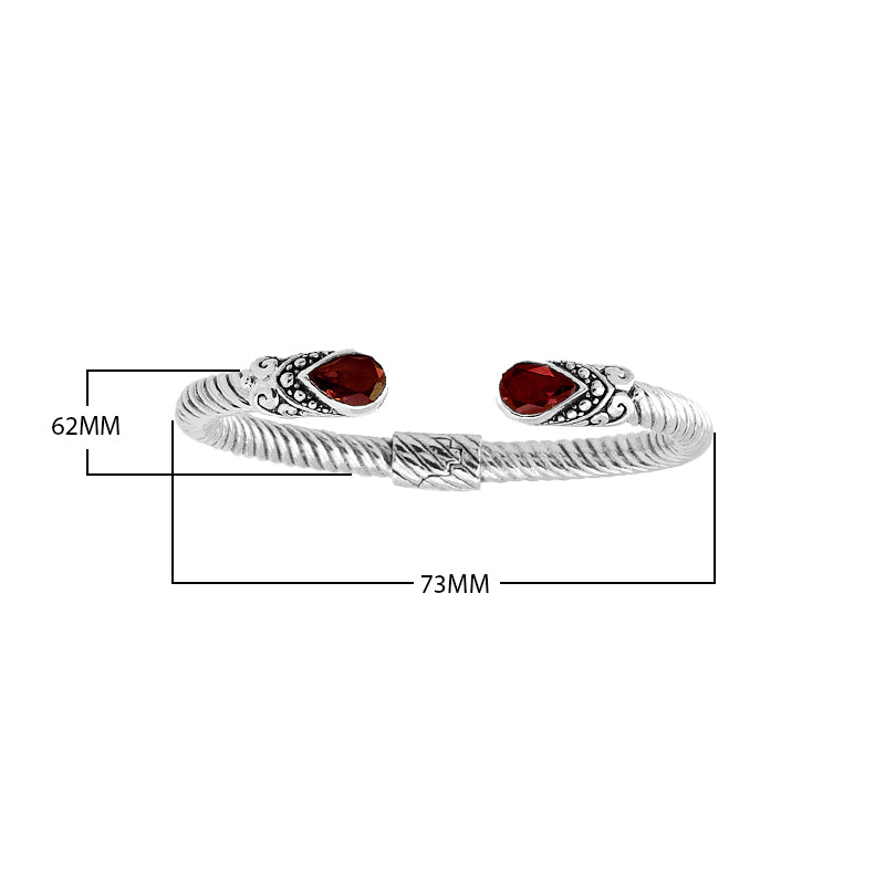 Sterling silver Balinese cuff Bangle with pear-shaped garnet, Quartz, and twisted cable design