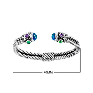 Sterling silver Balinese cuff bangle with blue topaz, amethyst, and Peridot quartz in twisted rope design