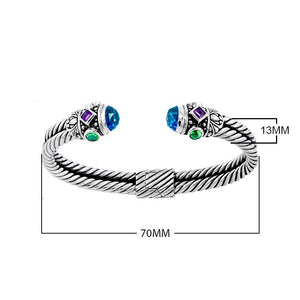 Sterling silver Balinese cuff bangle with blue topaz, amethyst, and Peridot quartz in twisted rope design