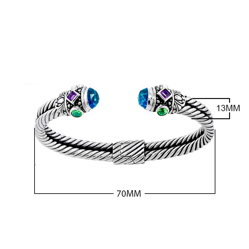 Sterling silver Balinese cuff bangle with blue topaz, amethyst, and Peridot quartz in twisted rope design