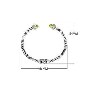 Wholesale sterling silver bangle with Peridot Quartz stones, twisted rope design, oxidized finish, and 18K gold plating, handmade in Bali.