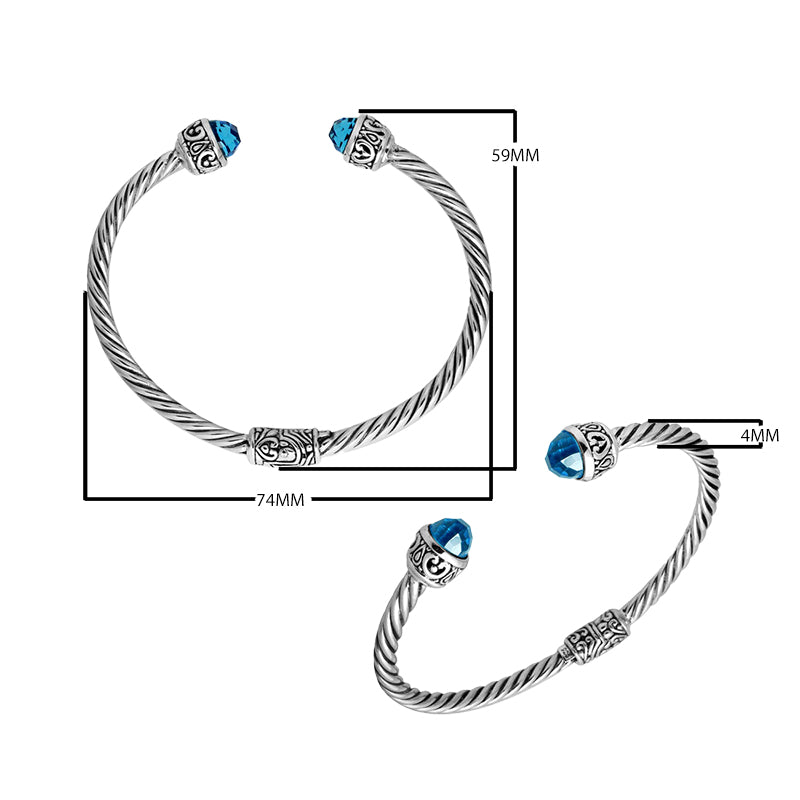 Wholesale sterling silver Blue Topaz Quartz bangle with twisted rope design and Balinese motifs, handcrafted in Bali.