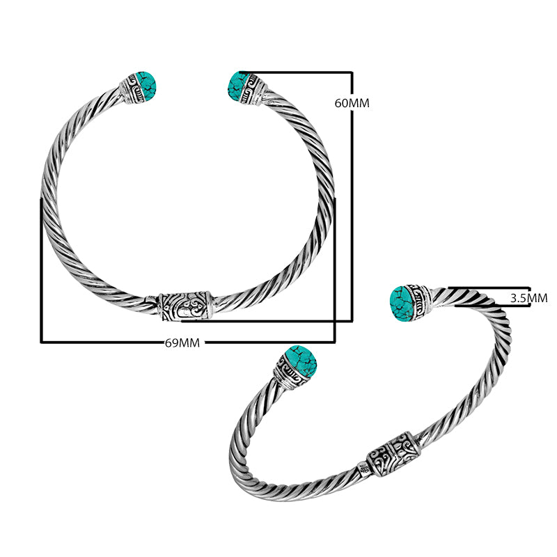 Wholesale sterling silver bangle with turquoise shell cabochons, twisted rope design, and Balinese motifs, handcrafted in Bali.