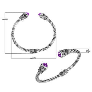 Sterling silver twisted bangle with amethyst quartz ends and Balinese carvings, handcrafted in Bali