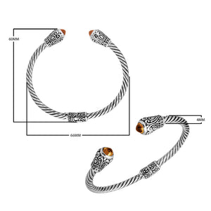 Sterling silver twisted bangle with citrine quartz ends and Balinese carvings, handcrafted in Bali