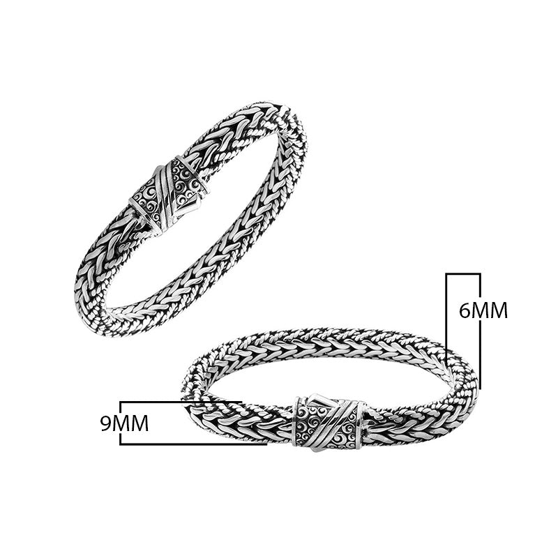 Sterling silver braided bracelet with ornate push clasp handcrafted in Bali.