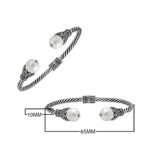 925 Sterling Silver Balinese Twisted Bangle With Shell Pearl And Hinge Lock On White Background