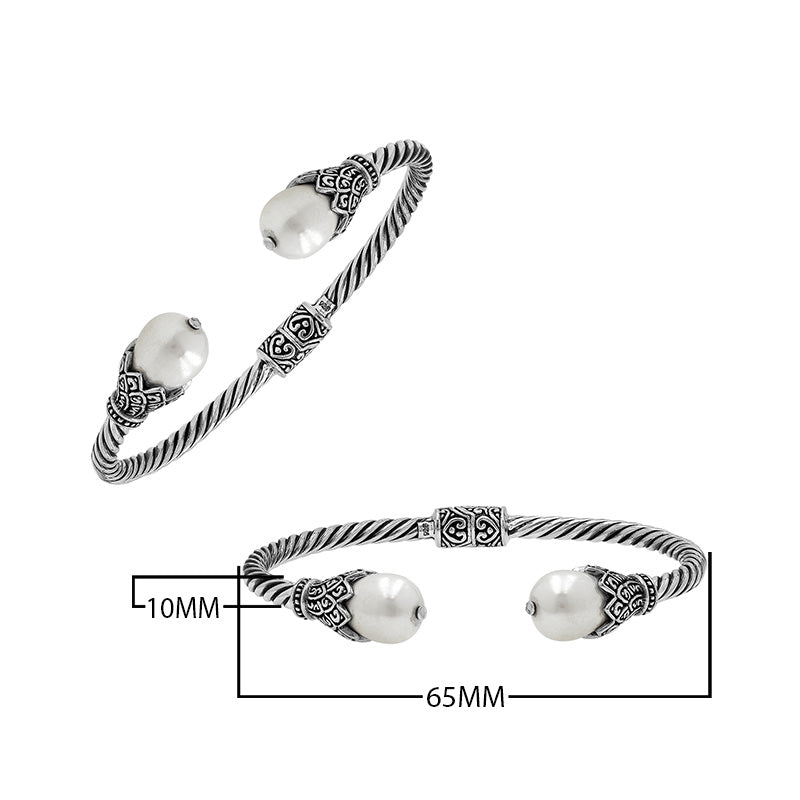 925 Sterling Silver Balinese Twisted Bangle With Shell Pearl And Hinge Lock On White Background